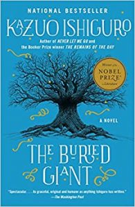 The Buried Giant's book cover, dominated by the black lines of a tree's gnarled branches and roots, on a blue background, with a slight shimmering of silver surrounding it.