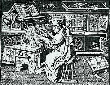 Scribe in a medieval scriptorium. (via)